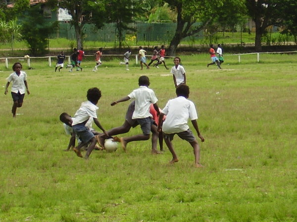 Kids playing soccer